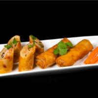 Crispy Imperial Rolls (Cha Gio) · Shrimp, pork, carrot, taro, mushroom, glass noodles.