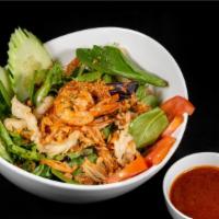 Seafood Salad (Gf) · Grilled seafood medley, spring mix salad, topped with crispy shallots and crushed peanuts, h...