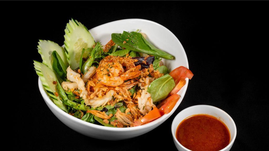 Seafood Salad (Gf) · Grilled seafood medley, spring mix salad, topped with crispy shallots and crushed peanuts, house dressing