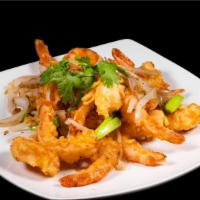 Salt & Pepper Shrimp · Lightly battered, tossed in garlic butter, onions, scallions, and peppers., Serve with rice