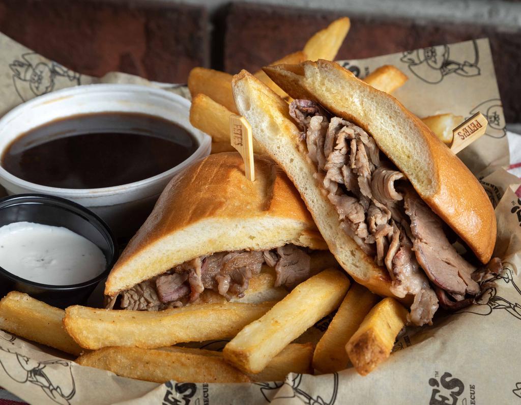#72. Prime Rib Dip · Premium Beef, tender thin-sliced, toasted French Roll, Au Jus.