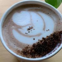 Hot Chocolate · Served all year long! Dark Chocolate Sauce and Vanilla Syrup with steamed milk (kid temp unl...