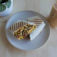 Breakfast Burrito · Pan Scrambled Eggs, Seasoned Hashbrowns, Chopped Bacon, Chipotle Aioli, and Cheddar Jack Che...