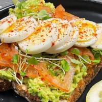 Avocado Toast · A thick spread of fresh Avocado on Noble Seeded Multigrain Bread topped with Tomato, Basil, ...
