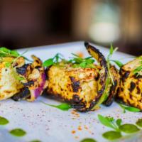 Kaffir Lime Paneer Tikka* · Indian cottage cheese marinated with kaffir lime yogurt and spices and then char grilled