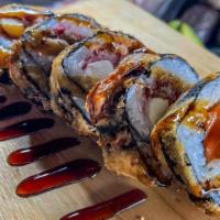 Vegas Roll · salmon, cream cheese, and crab mix battered and deep fried for a crunchy finish