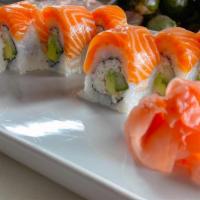 Alaskan Roll · California roll, topped with salmon