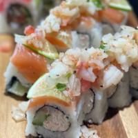 Ceviche Roll · cucumber, avocado, crab mix topped with salmon, lemon and  house made ceviche, drizzled with...