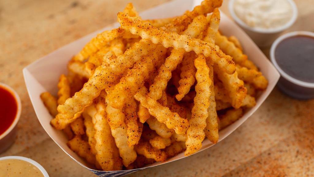 Cajun Fries · Seasoned with our kickin' mix of spices.
