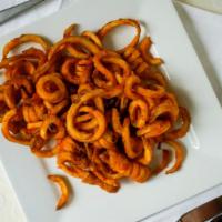 Curly Fries · Curly fries served with your choice of sauce ketchup, garlic, tzatziki or hot sauce.
