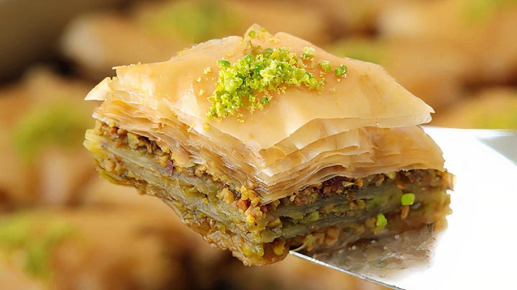 Fresh House Baklava · House made Baklava is a rich, sweet dessert pastry made of layers of filo filled with chopped nuts and sweetened and held together with syrup and rose water.