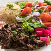 Beef Shawarma Plate · Local beef delicately sliced & seasoned in house. Plate comes with house salad, fresh sauces...