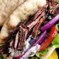 Beef Gyro · Fresh local beef served in hot pita bread. Served with Tomatoes, lettuce, onions, green pepp...