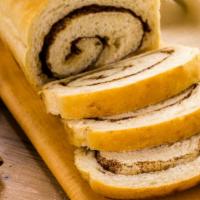 Cinnamon Bread · Perfectly baked bread, drizzled with a layer of cinnamon.
