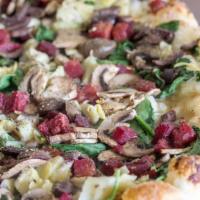 Beetnik Pizza · Garlic olive oil sauce, spinach, roasted beet, artichoke heart, mushroom, kalamata olive, an...