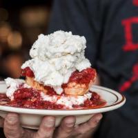 Strawberry Shortcake · Biscuit smothered with sweet strawberry sauce topped with whipped cream.