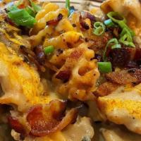 Sully'S Fries · Waffle fries smothered in housemade sausage
gravy or vegetarian mushroom gravy, Tillamook
pi...