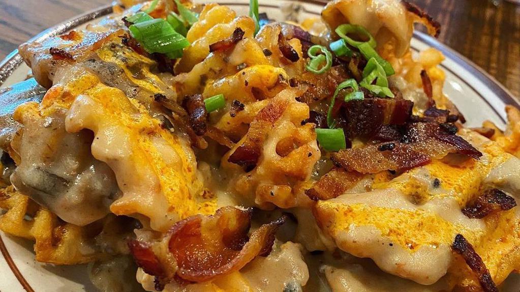 Sully'S Fries · Waffle fries smothered in housemade sausage
gravy or vegetarian mushroom gravy, Tillamook
pimento cheese, bacon and green onions