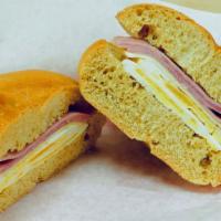 Ham, Egg, And Cheese Breakfast Sandwich · Choice of bagel, croissant, toast, english muffin