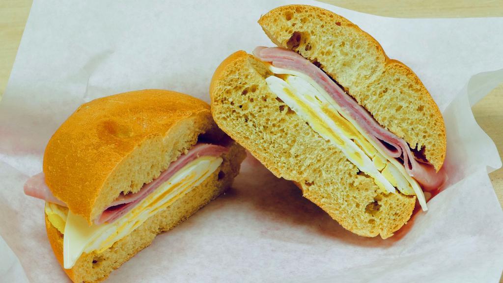 Ham, Egg, And Cheese Breakfast Sandwich · Choice of bagel, croissant, toast, english muffin