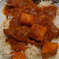 Lamb Vindaloo · Lamb cooked with pieces of potatoes and special spicy sauce.