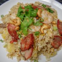 Gata Fried Rice · Combination of beef, chicken, BBQ pork, and shrimp with chunks of pineapple and cashew nuts.