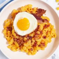 Wake Up Lucky Mac · The classic creamy mac and cheese cooked with bacon and topped with a fried egg. Add Chicken...