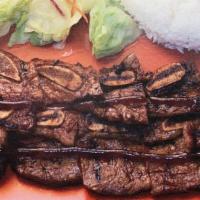 Beef Short Ribs Teriyaki · Grilled beef short ribs with traditional Japanese thick sweet sauce, teriyaki. Comes with st...