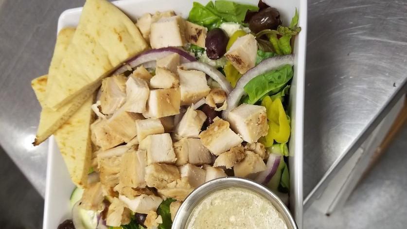 Greek Chicken Salad · 5 ounces of grilled chicken breast, feta cheese, kalamata olives, cucumber, tomato, red onion, and pepperoncini on crisp romaine lettuce with feta dressing.