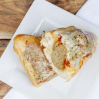 Motor City Meatball · Housemade meatball and marinara, topped with provolone cheese, stuffed, and baked in an Ital...