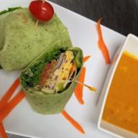 Garden Fresh Wrap · Swiss and cheddar cheese, hummus, cucumber, red, and green bell pepper, lettuce, tomato, red...