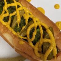 Chicago Dog · 1/4 pound all beef dog topped with relish, diced tomato, red onion, sport peppers, yellow mu...
