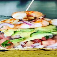 Tostadas Mixtas (Mixed Tostadas) · Consuming raw or undercooked meats, poetry seafood, shellfish, or eggs may increase your ris...