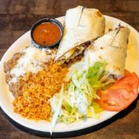 Breakfast Burrito · Scrambled eggs, bacon and hash browns rolled in a flour tortilla and melted cheese, served w...