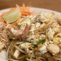 Phad Thai · Stir-fried rice noodles with egg, green onions, fresh bean sprouts, ground peanuts