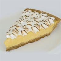 Passion Fruit Pie Slice - Slice · Sweet passion fruit tart topped with toasted merengue.