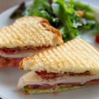 Turkey Club · Butter lettuce, tomatoes, roasted turkey, swiss cheese bacon, red onion, mayo and mustard on...