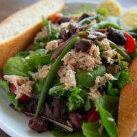 Nicoise · Mixed greens, olives, albacore tuna, tomatoes, egg, minced anchovies with balsamic vinaigret...