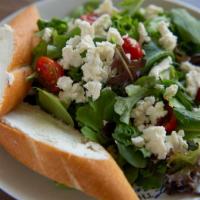 Provencale · Mixed greens, goat cheese, and goat cheese Crostinis with balsamic vinaigrette dressing.