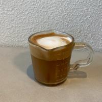 Cortado · Double shot topped with steamed cream served in an 8oz