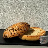 Everything Bagel  · Toasted Everything bagel served with butter. Add cream cheese for $0.75 each