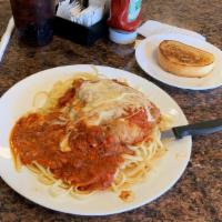 Chicken Parmesan · Served with spaghetti noodles.