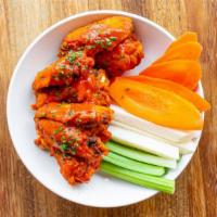 Chicken Wings · Gluten free. Bone-in or boneless, your choice of sauce: buffalo,
sriracha honey bbq, atomic,...