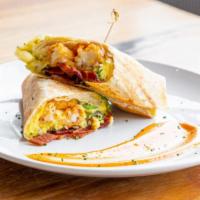 Hangover Burrito · Scramble eggs, smashed tot hash, peppers, onions, guac, cheddar, pepper jack, sour cream, an...