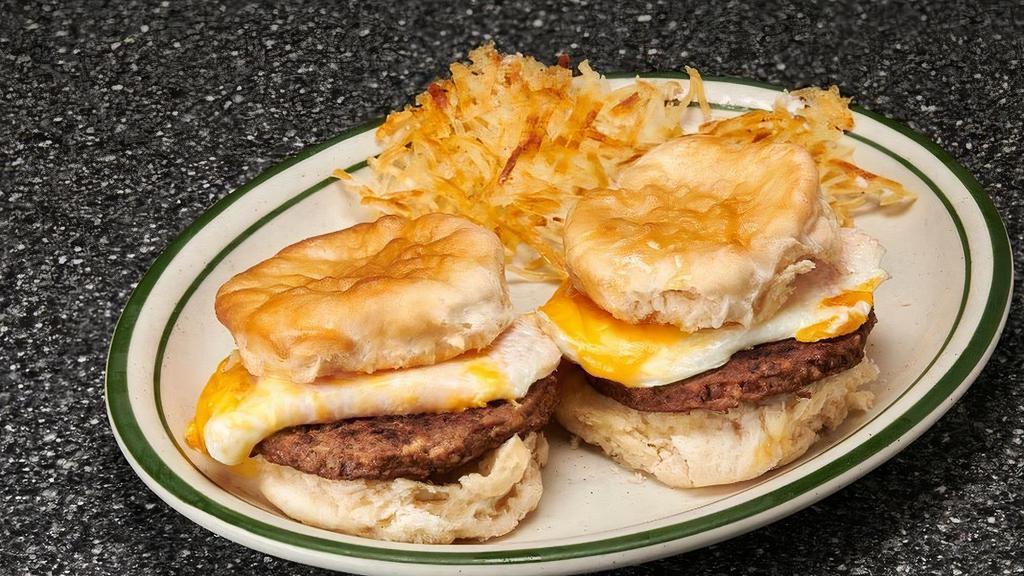 Anthony Quinn · 2 jalapeno cheddar biscuits with chorizo patties, cheddar cheese, topped with fried eggs & served with hashbrowns