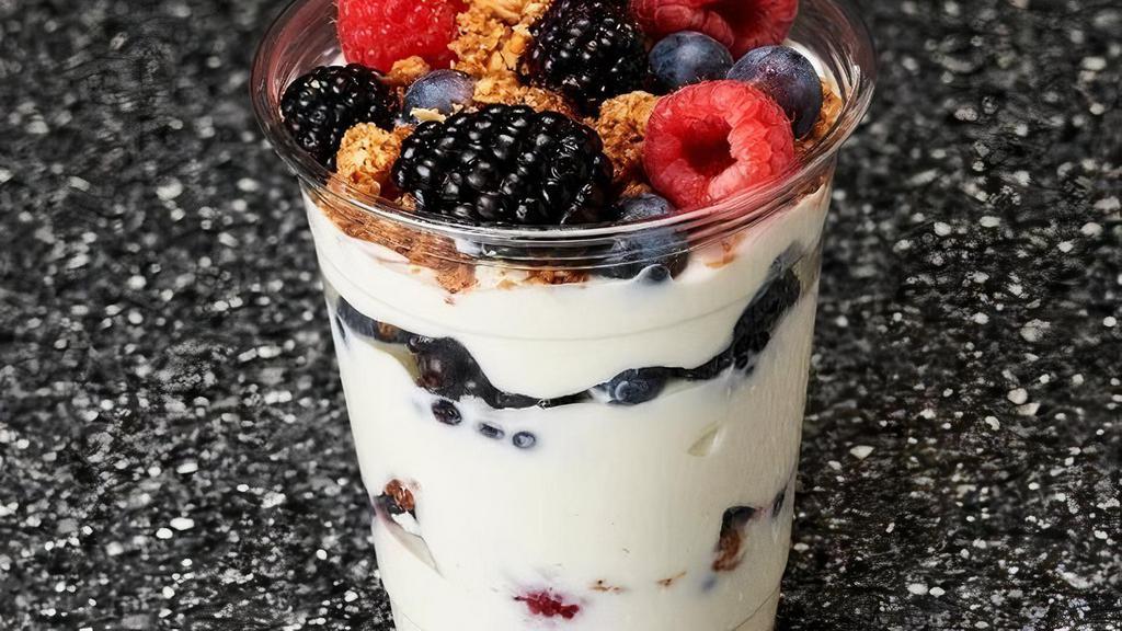 Parfait · Green vanilla yogurt layered with fresh fruit with granola on the side