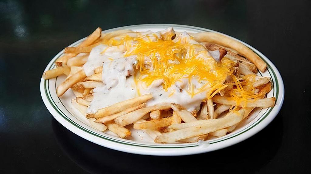 Elvis Fries · fries topped with sausage gravy & cheddar cheese