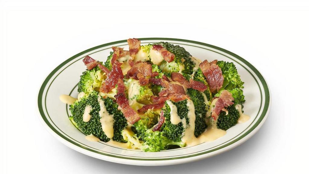 Bamm Broccoli · broccoli topped with cheese sauce & bacon bits