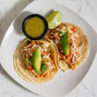 Regular Tacos · Includes 2 corn tortillas, onions, cilantro, and salsa.