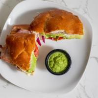Hawaiiana Torta · Ham, melted cheese, pineapple, tomato, onions, and avocado. A grilled Mexico city-style sand...